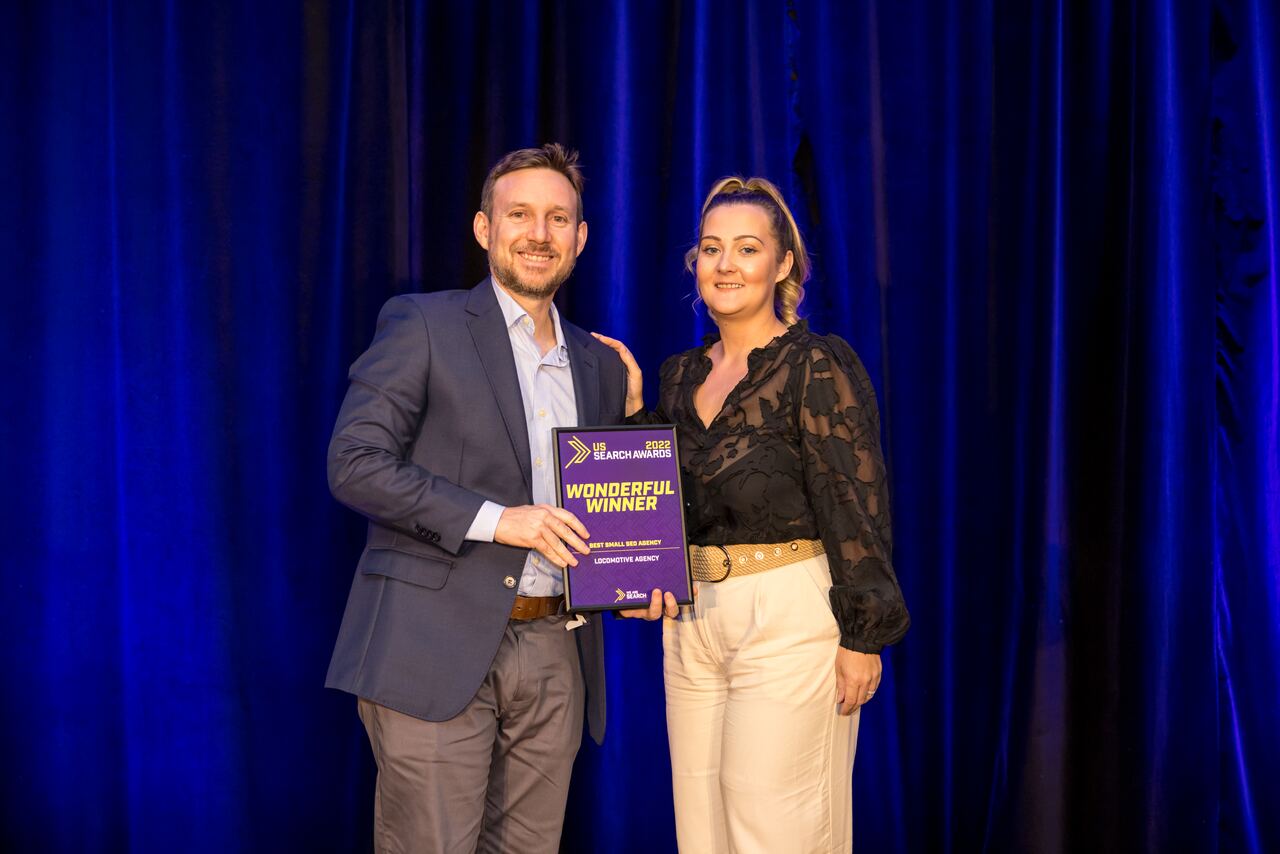 Robert Padgett Cooper receiving the 2022 US Search Award for Best Small SEO Agency